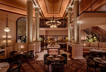 interior of Mezzogiorno by Afroditi in moody light and warm red and brown tones