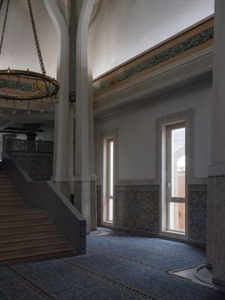 Hallway with large staircase