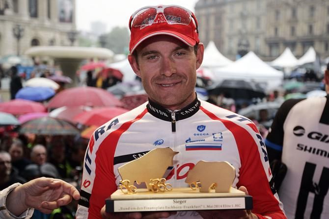 Alexander Kristoff (Katusha) presented with the winner's trophy on the podium at the GP Frankfurt