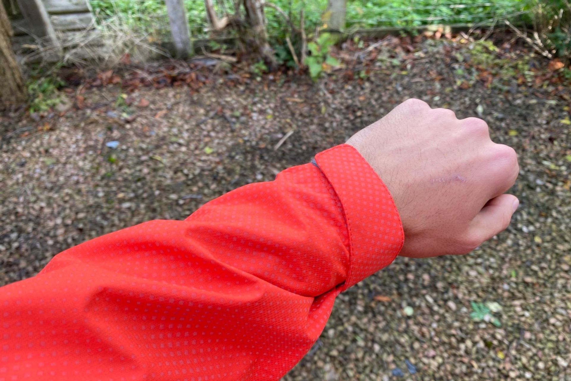 Image shows a rider wearing the Castelli Reflex Commuter Jacket.