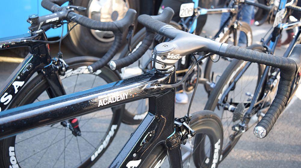 The Israel Cycling Academy bikes have blue flecks in their paint, which catch the sun light