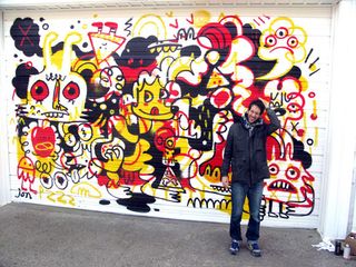 Jon Burgerman infront of garage