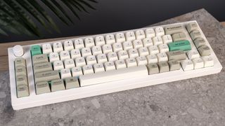 A shell white Keychron Q65 Max wireless mechanical keyboard