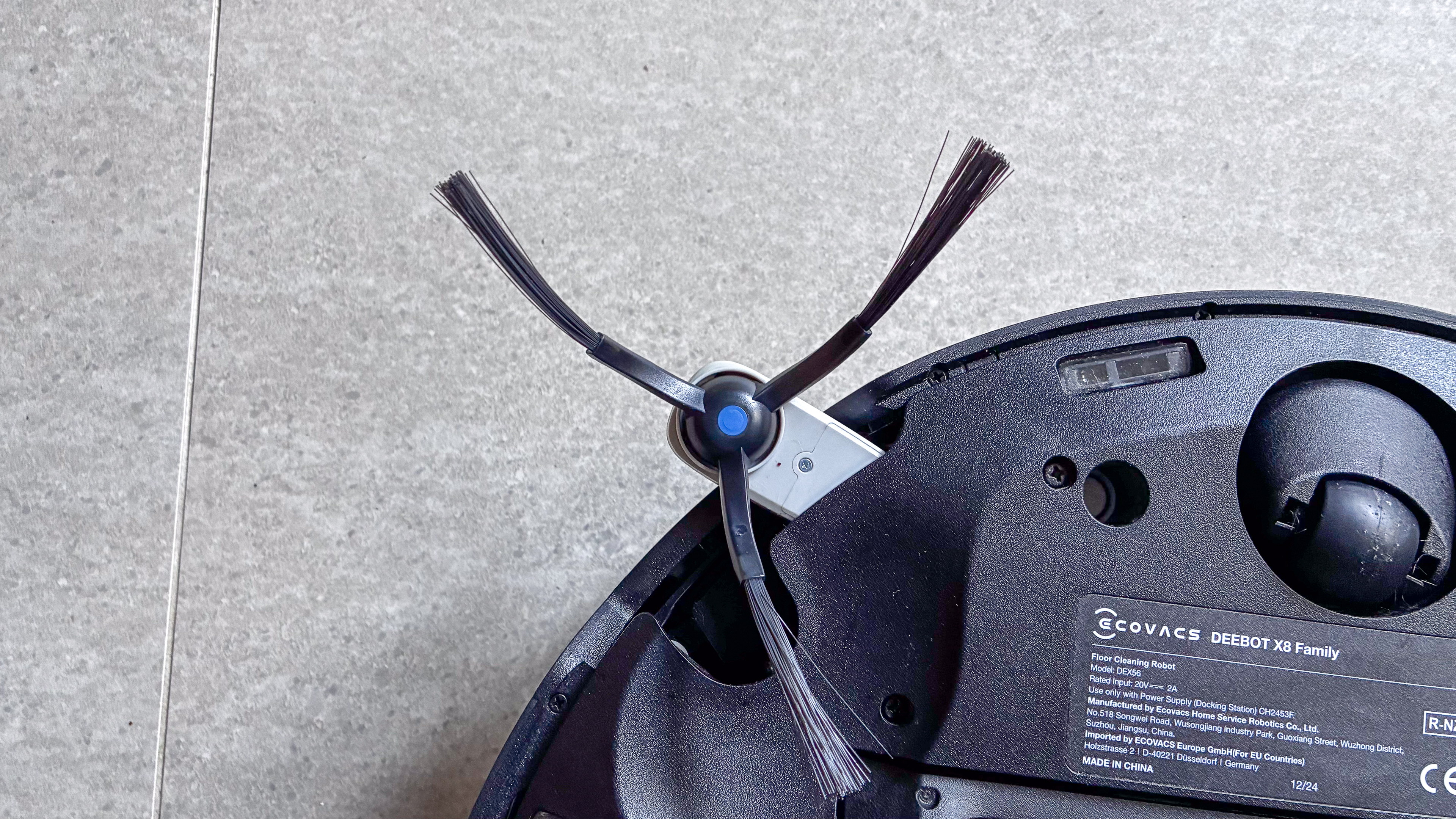 The extendable side brush of the Ecovacs Deebot X8 Pro Omni robot vacuum