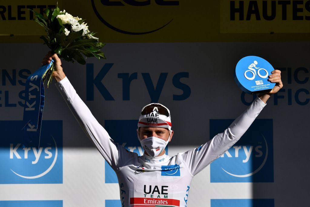 Team UAE Emirates rider Slovenias Tadej Pogacar celebrates his best youths white jersey on the podium after the 4th stage of the 107th edition of the Tour de France cycling race 157 km between Sisteron and OrcieresMerlette on September 1 2020 Photo by AnneChristine POUJOULAT AFP Photo by ANNECHRISTINE POUJOULATAFP via Getty Images