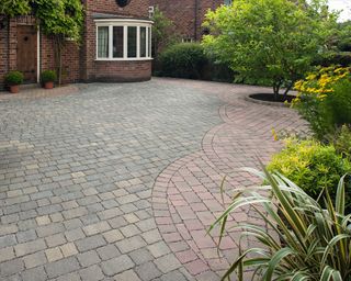 front yard driveway featuring permeable paving by Marshalls