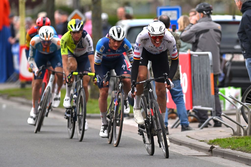 KOKSIJDE BELGIUM MARCH 15 Nils Politt of Germany and UAE Team Emirates attacks in the final kilometres during the 22nd Bredene Koksijde Classic 2024 a 2012km one day race from Bredene to Koksijde on March 15 2024 in Koksijde Belgium Photo by Luc ClaessenGetty Images