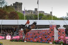 Royal Windsor Horse Show puissance -Nici Wilson and Guaranteed Quality in the puissance at Royal Windsor Horse Show