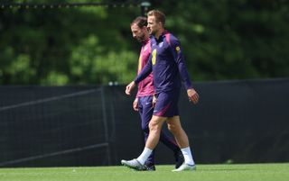 Gareth Southgate and Harry Kane during an England training session