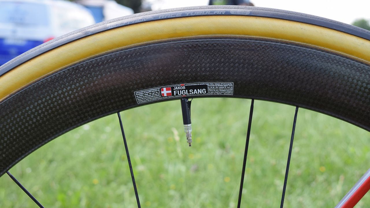 Fuglsang's race wheels are labelled up with his name and the Danish flag