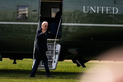 Biden walks to the Oval Office