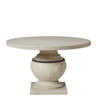 Round Callanish Outdoor Dining Table – $2,895 on OKA