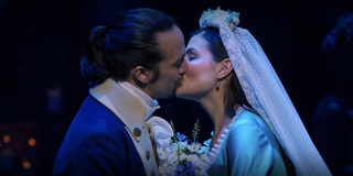 Alexander Hamilton (Lin-Manuel Miranda) and Eliza Schuyler (Phillipa Soo) share a kiss in a scene fr