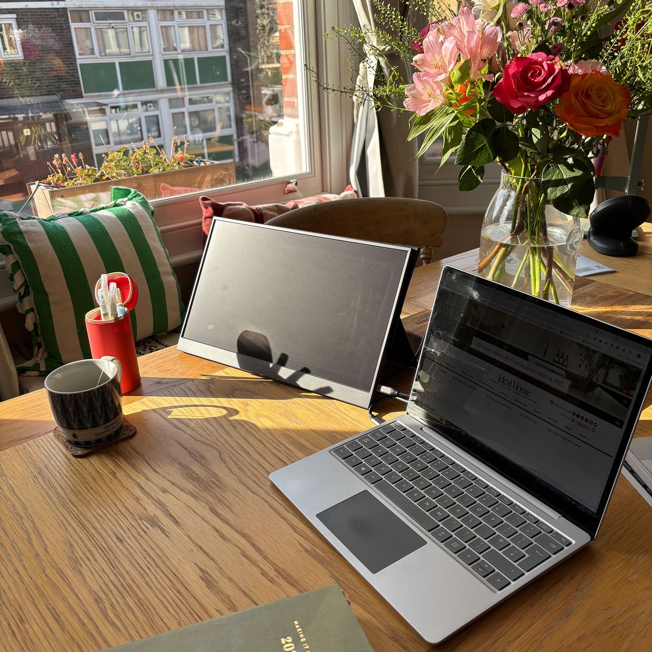 Aldi portable monitor set up next to laptop