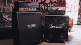 Mesa/Boogie stacks against a patterned background