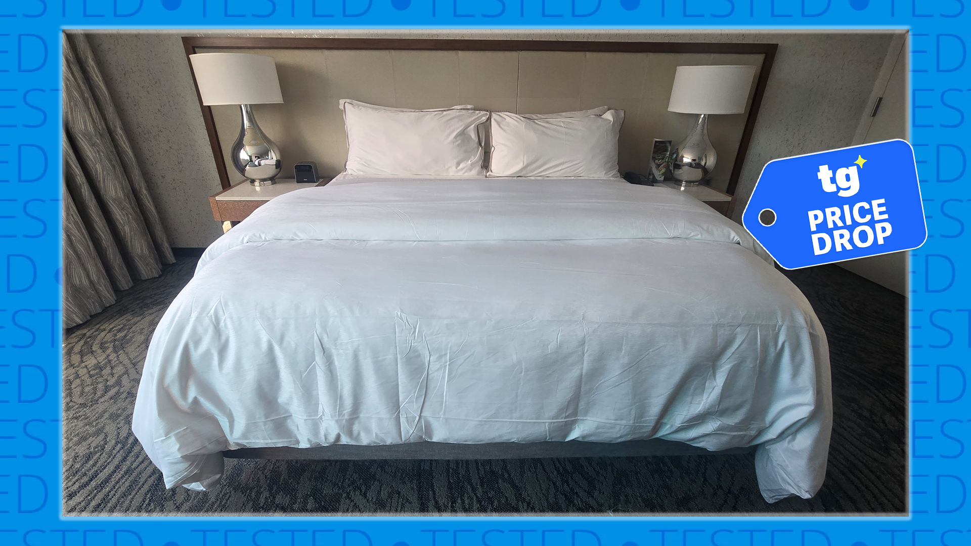 The Westin Heavenly Bed in a Westin Hotel room. It's surrounded by a blue barrier saying 'tested'. On the right hand side is a Tom's Guide price drop deals badge