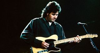 Vince Gill plays his Butterscotch Fender Telecaster onstage