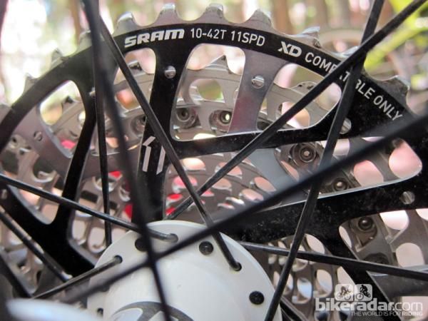 The largest cog is a pressed-on aluminum piece that also includes the spline interface for the new XD driver body. There's more than enough room for mud to pass through.
