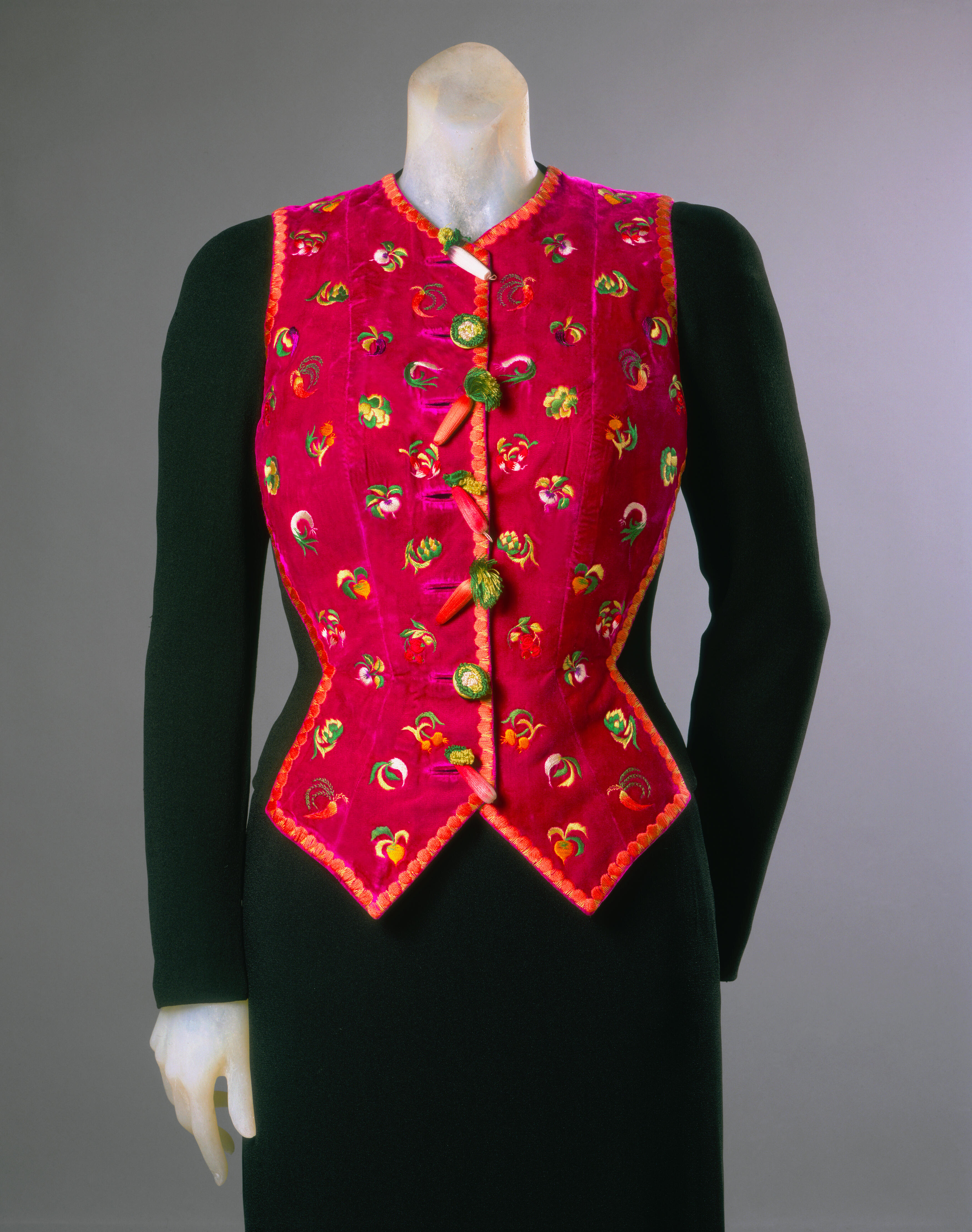 Woman's Dinner Jacket, Summer 1941, Elsa Schiaparelli, black rayon crepe, magenta cellulose acetate velvet with silk embroidery, Center Back Length: 19 1/4 inches (48.9 cm) Center Front Length: 16 inches (40.6 cm), Gift of Mme Elsa Schiaparelli, 1969, 1969-232-17