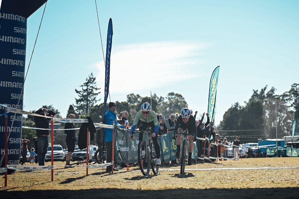 Courtney Sherwell winning the Devils Cardigan 2024 and the AusCycling Gravel Championships after a tight sprint with Justine Barrow