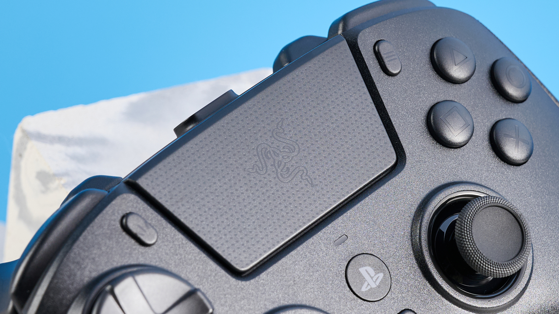 A black Razer Raiju V3 Pro controller for PS5