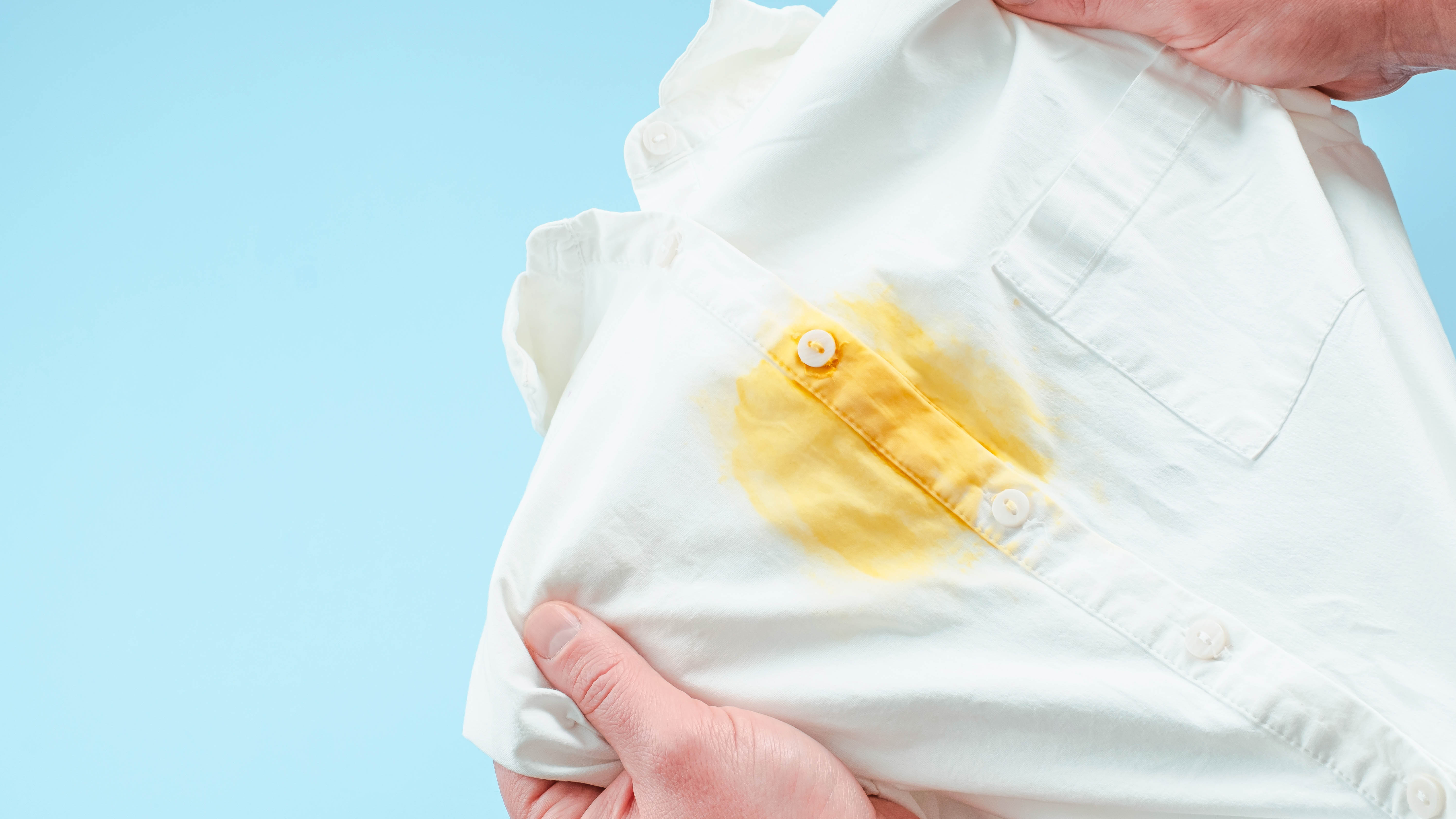 A white shirt with a yellow stain