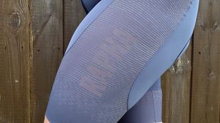 A close up of the Rapha Powerweave fabric, with the Rapha logo stitched into it