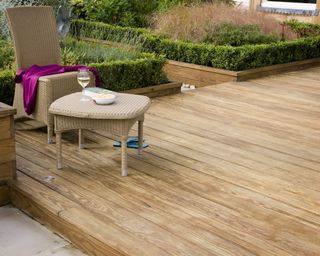 decking with furniture and plants