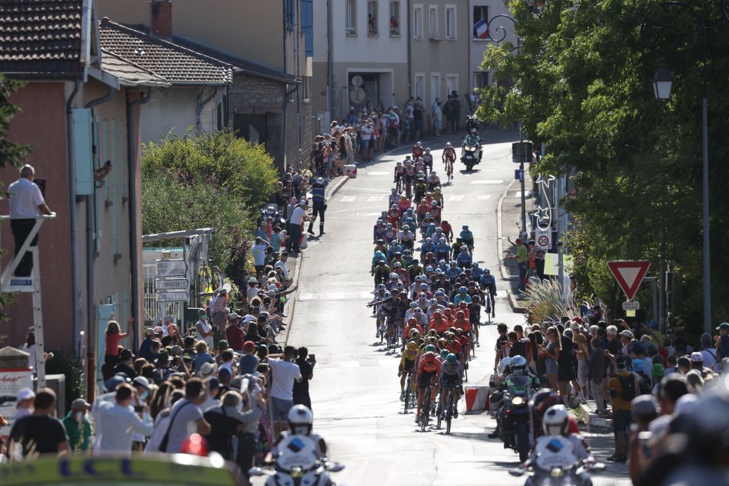 The pack rides during the 14th stage of the 107th edition of the Tour de France cycling race 197 km between ClermontFerrand and Lyon on September 12 2020 Photo by KENZO TRIBOUILLARD AFP Photo by KENZO TRIBOUILLARDAFP via Getty Images
