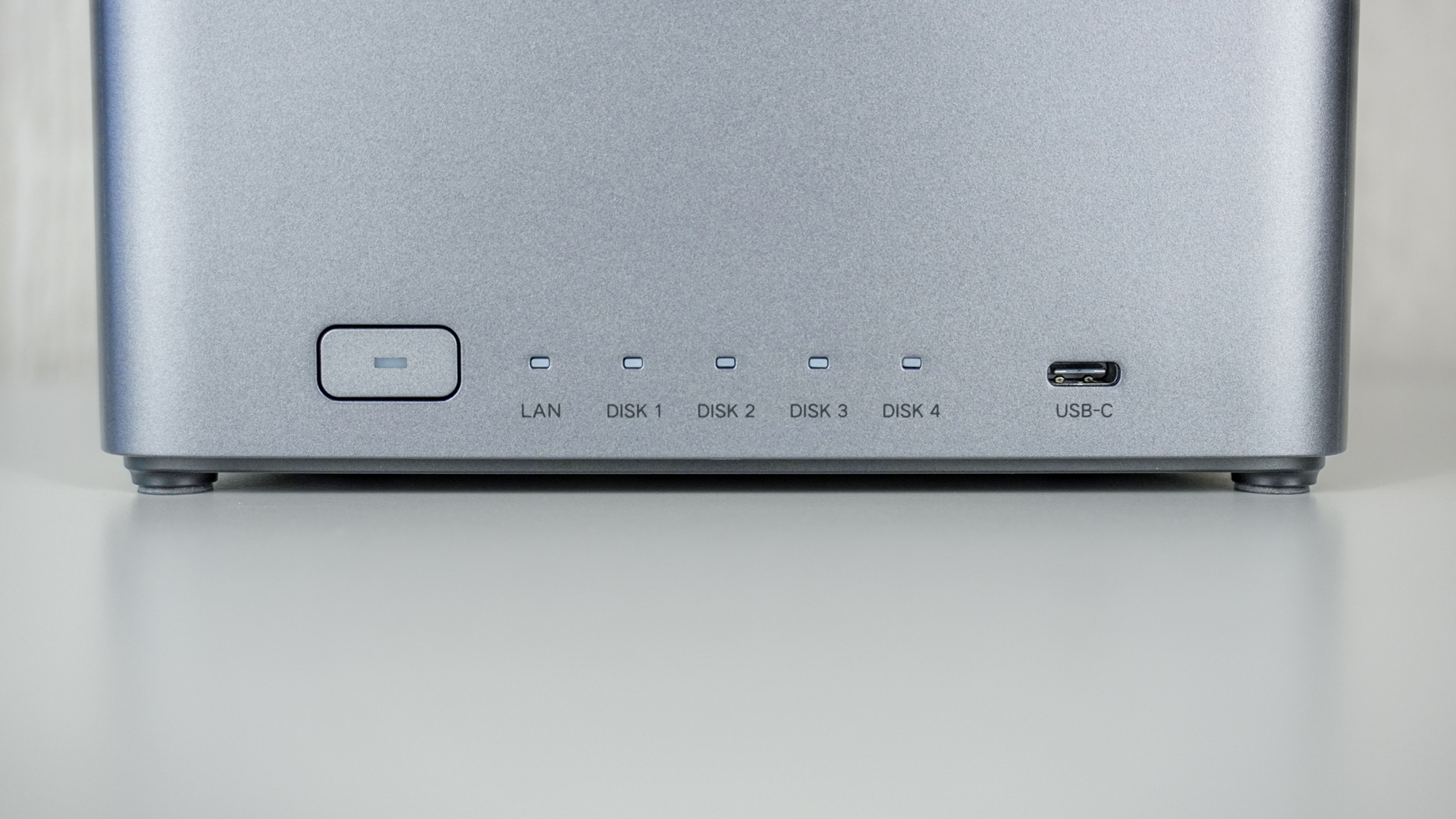 The front USB-C port, power button and indicators on the bottom of the Ugreen NASync DH4300 Plus