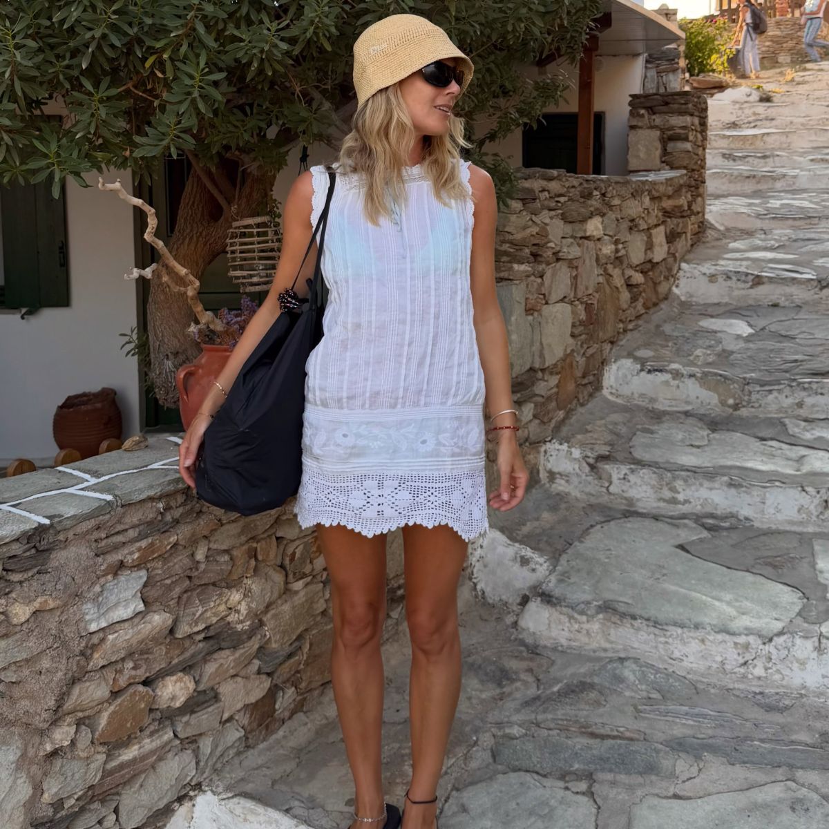 Lucy Williams on a summer holiday, with bronzed skin, reminiscent of Est&eacute;e Lauder Bronze Goddess