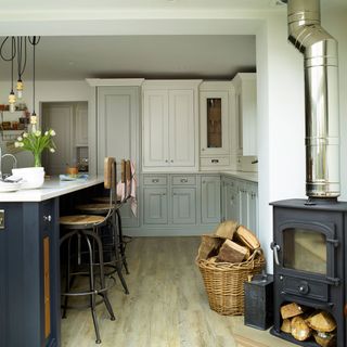 kitchen room with kitchen cabinets and wooden flooring