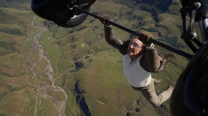 Tom Cruise hangs from a plane in Mission: Impossible - The Final Reckoning