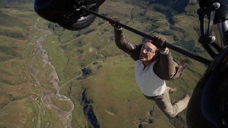 Tom Cruise hangs from a plane in Mission: Impossible - The Final Reckoning