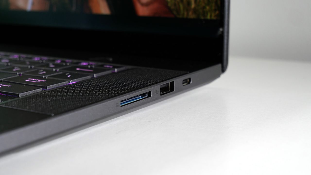 Close up on the ports on the right side of the Asus ROG Zephyrus G16 (Ryzen AI 9), which include a Thunderbolt, USB Type-A, and an SD card slot.