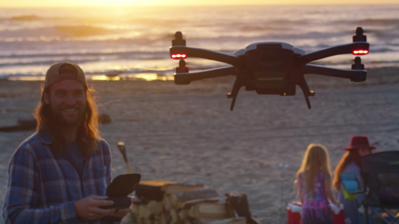 GoPro Karma drone flying on a beach at sunset