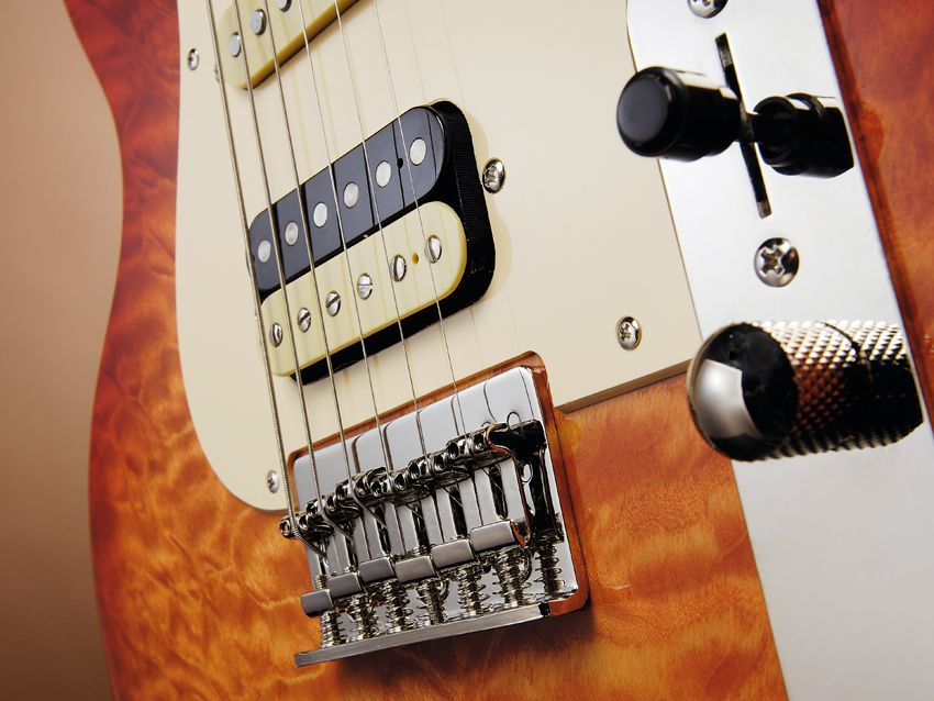 The Bluesmaster IV is more Gibson inspired, despite the Tele-style control plate