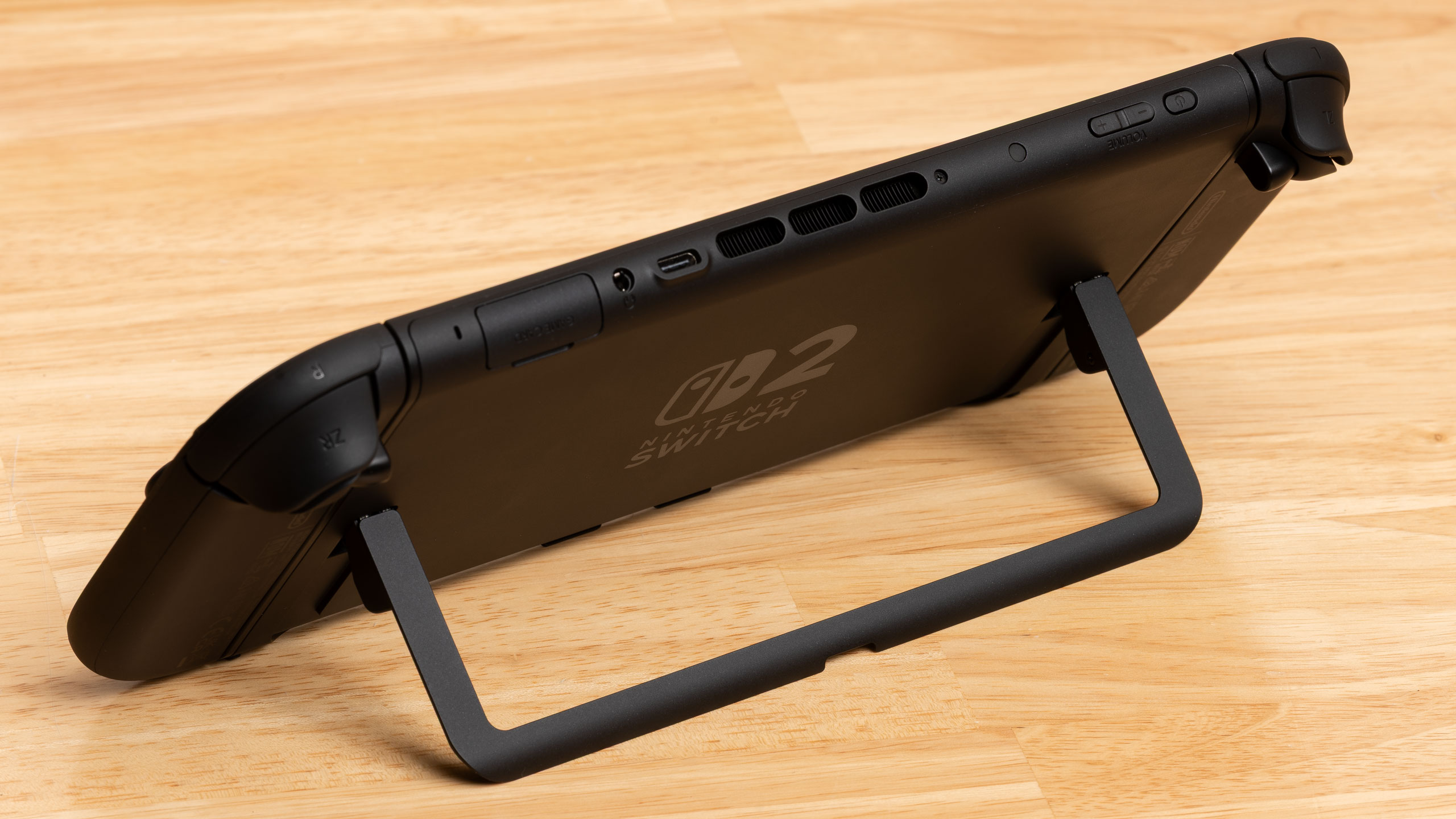 A rear view of the Nintendo Switch 2 propped up on its kickstand