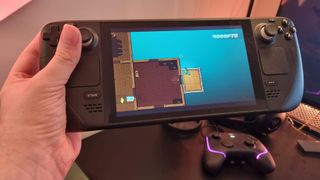 Photo of Steam Deck handheld console playing Hotline Miami 2
