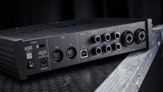 How to choose an audio interface: rear view of IK Multimedia Axe I/O focusing on connections