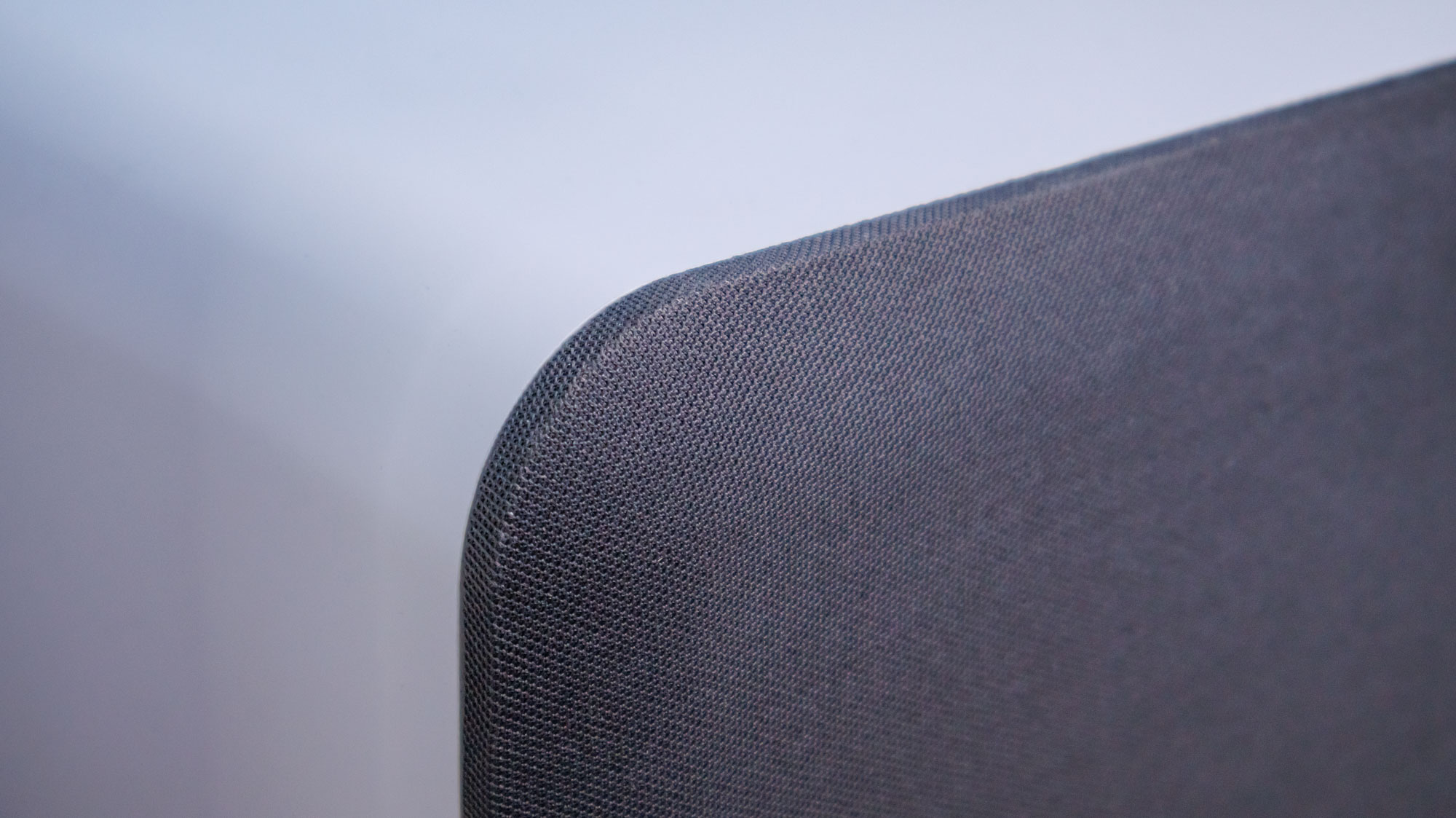 Closeup image of the Qacoustics-sub80 speaker grille and enclosure