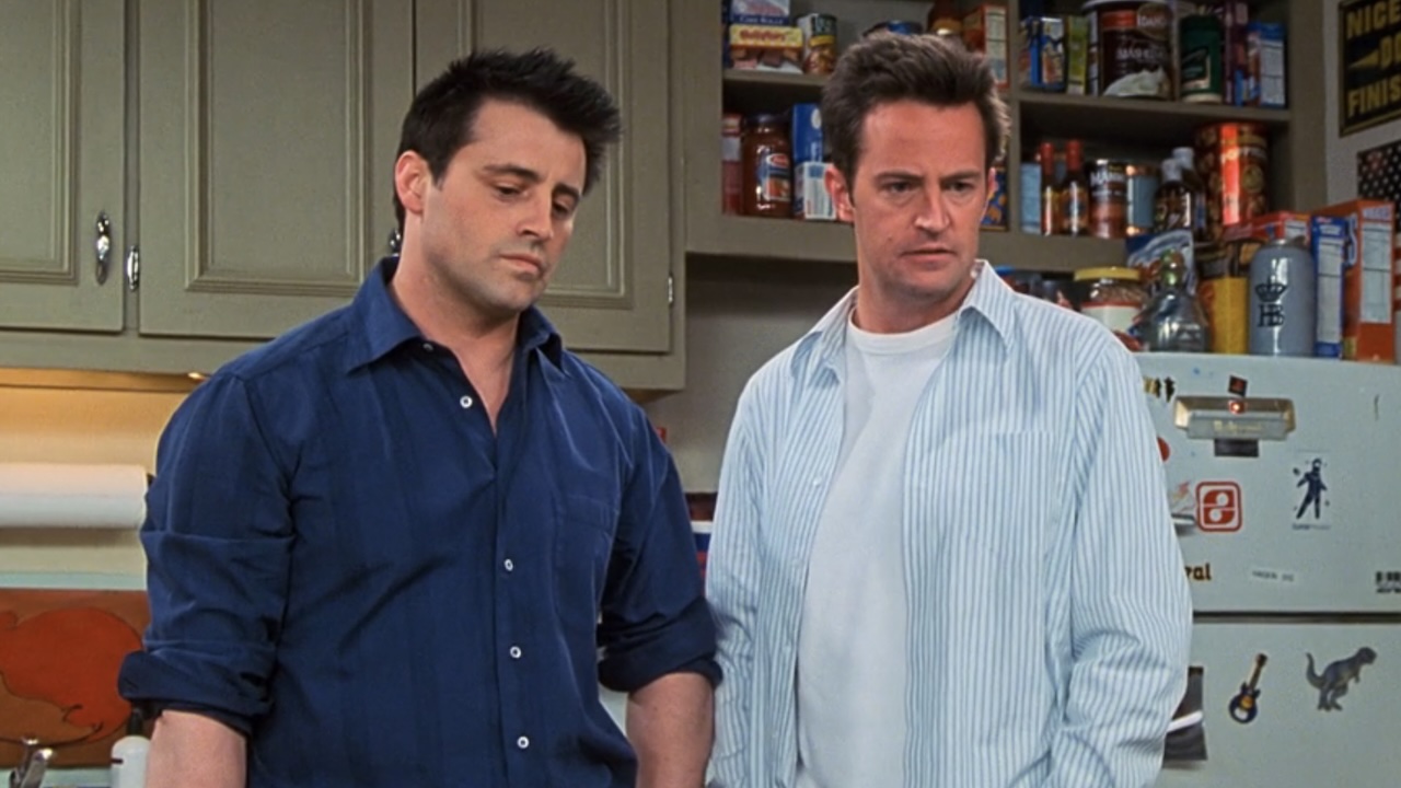 Joey and Chandler staring at the foosball table in Friends' series finale