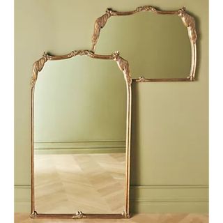 Gold framed peacock mirror