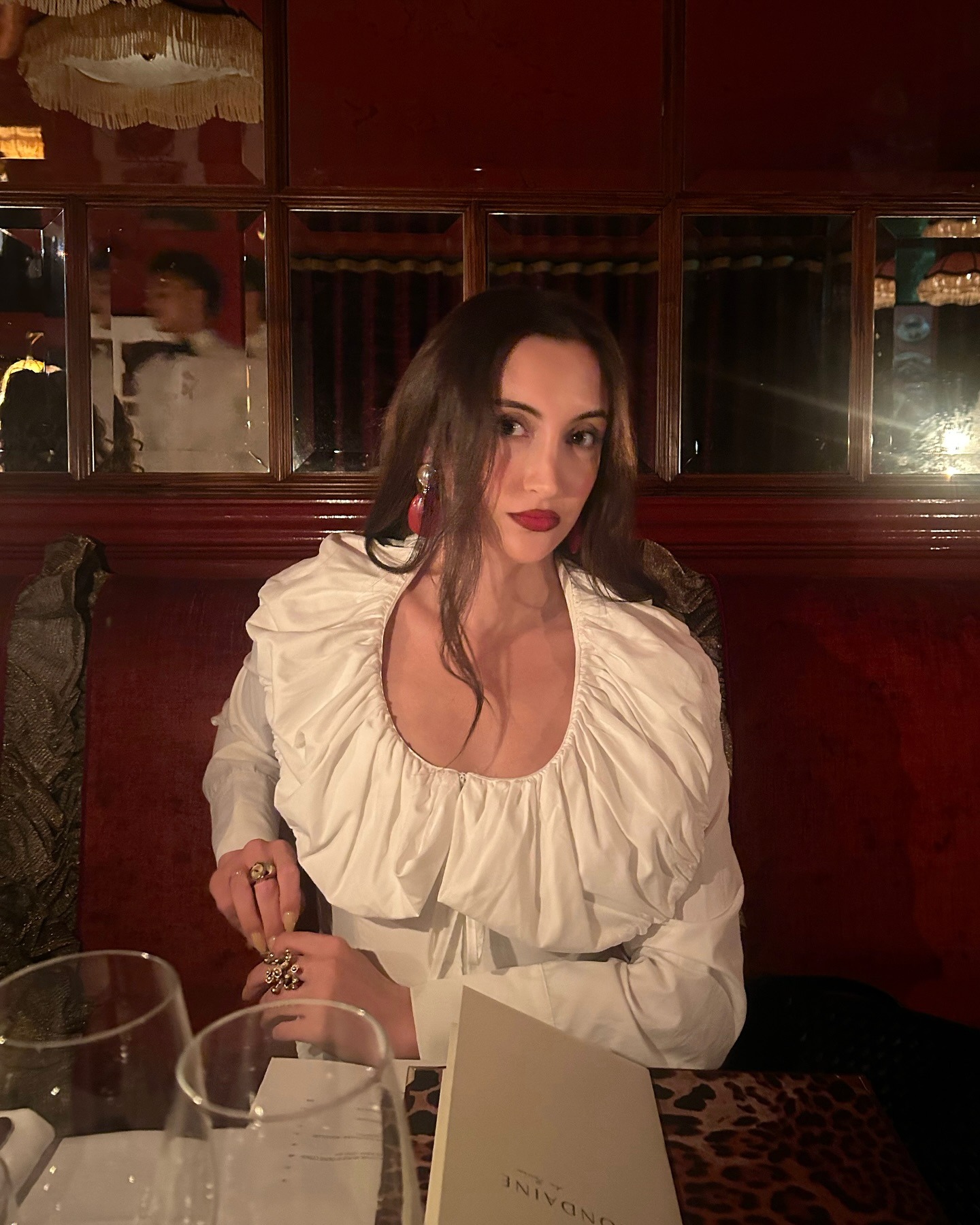 WWW beauty editor Alyssa Brascia wearing red lipstick.