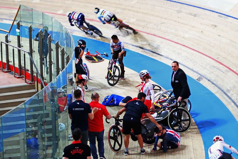 Martina Fidanza of Italy is injured after a group fall in the Women's scratch 10k on day one of the UCI Track Cycling World Championships