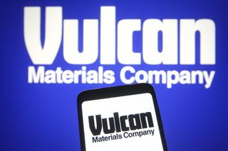 Vulcan Materials logo on blue background and on smartphone