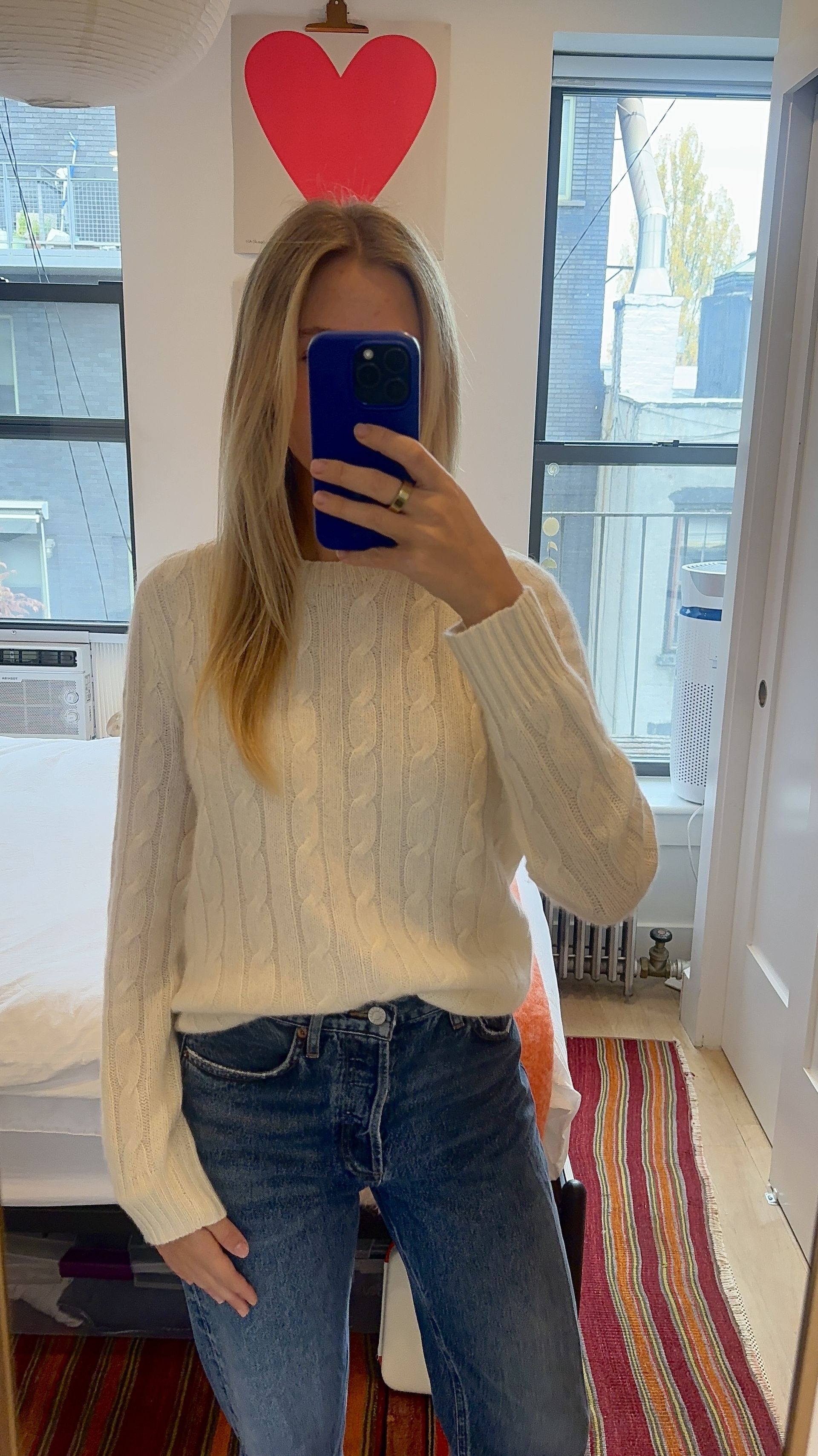 Bailey Burke in a cashmere sweater.