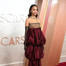 zoe saldana on the 2025 oscars red caroet