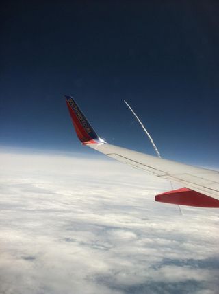 Ryan Graff took this photo of space shuttle Atlantis' final launch from the window of a Southwest Airlines plane.