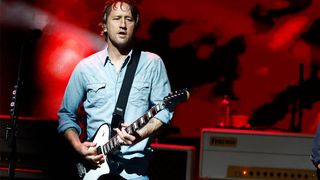Chris Shiflett plays live with Foo Fighters in Washington D.C., with what looks like one of his new signature Tele prototypes